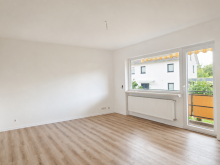 Wohnzimmer Attraktive 2-Zimmer-Wohnung nach Kernsanierung in Walluf